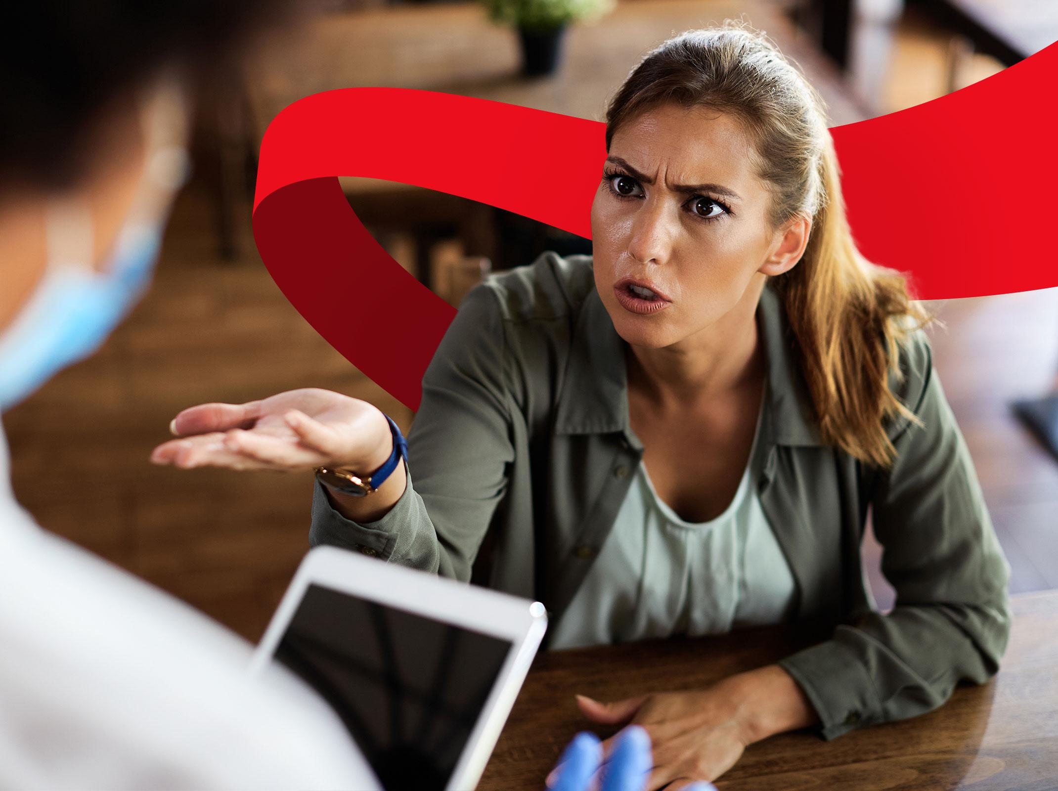 Business professional handling an exchange with an angry customer