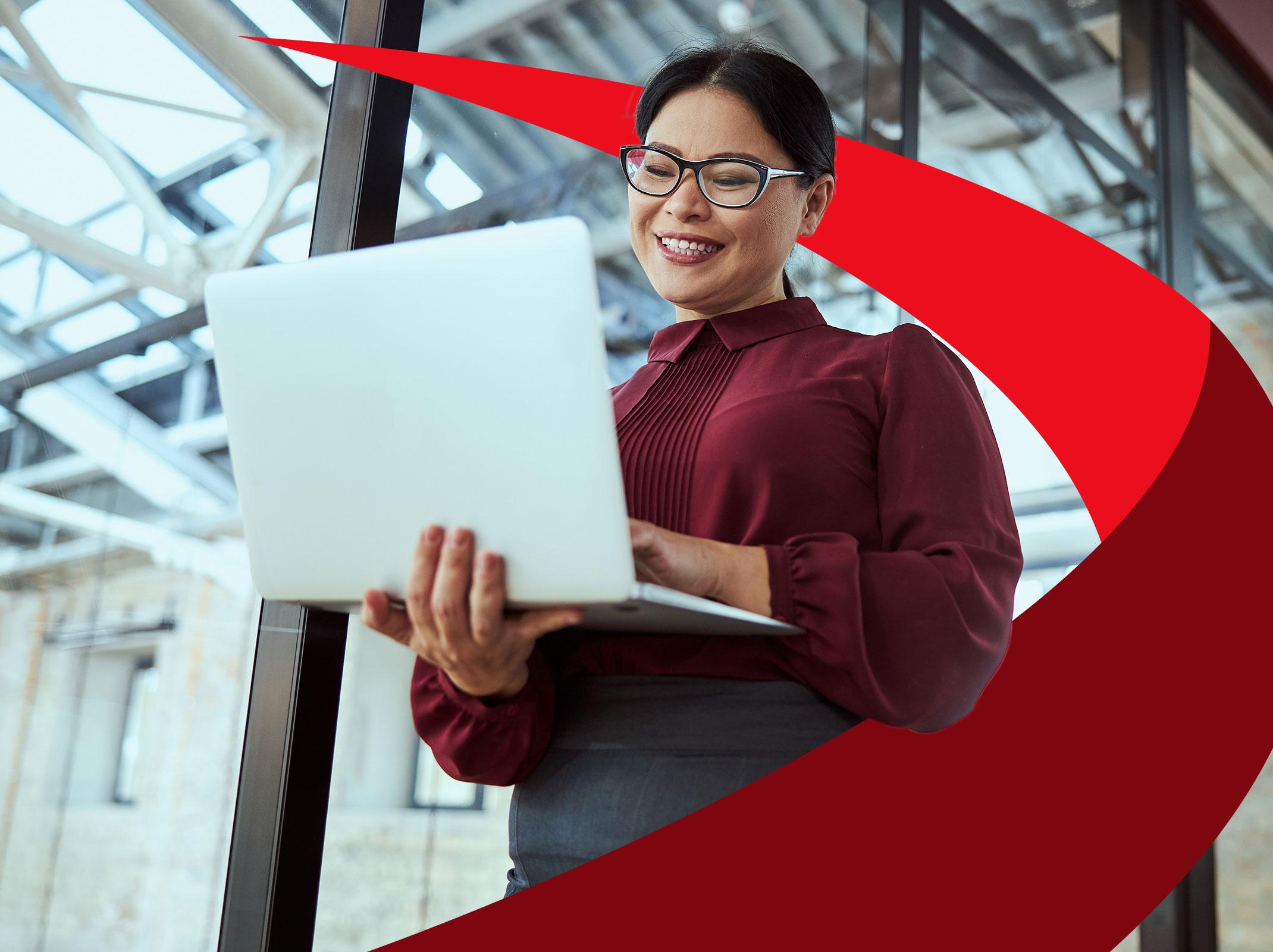 Young Asian woman holding a laptop