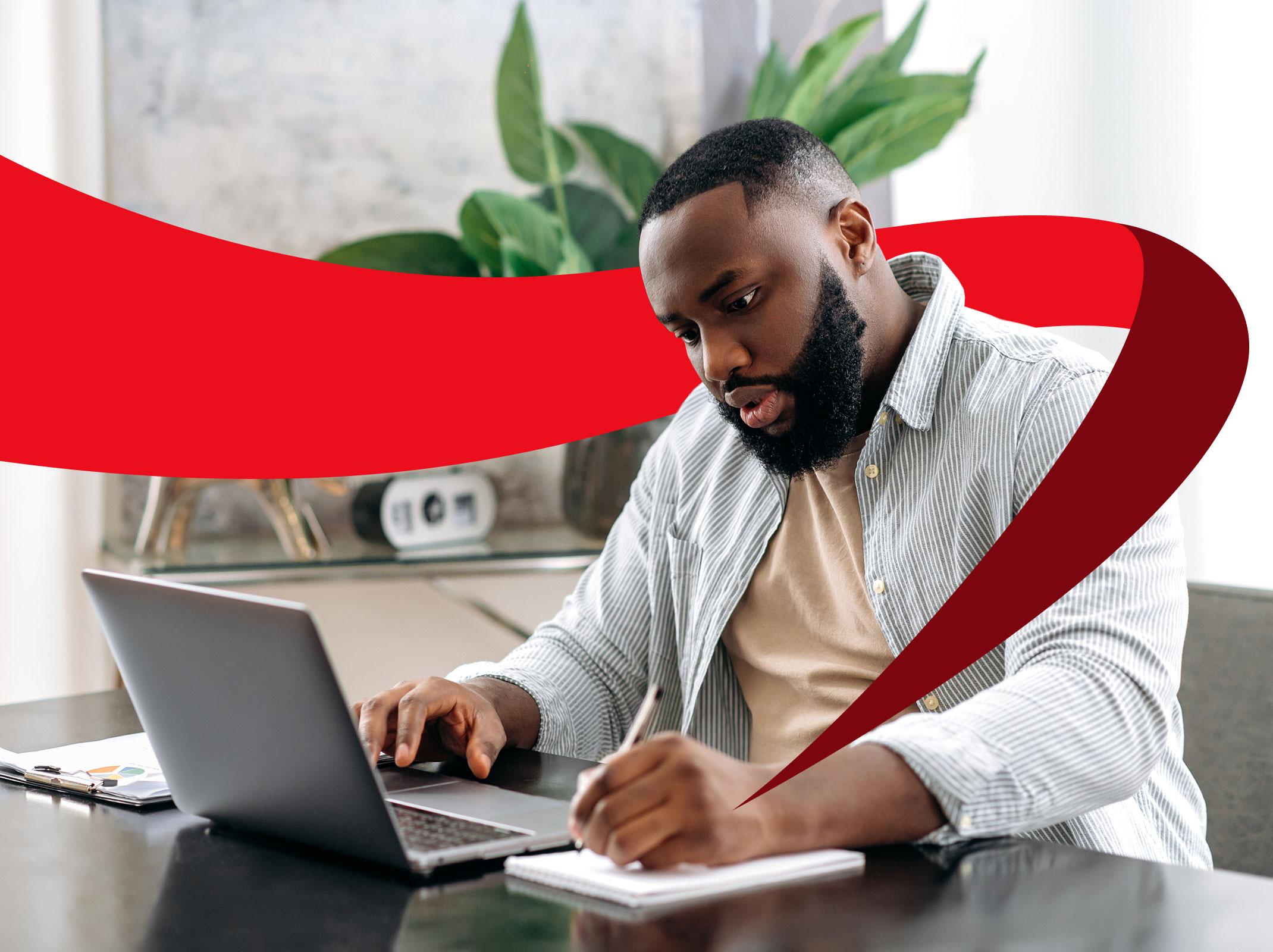 Man using computer for business writing