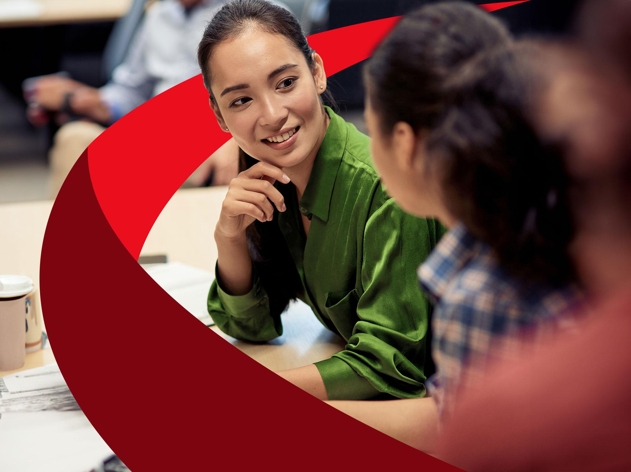 Business professional communicating with tact with a coworker