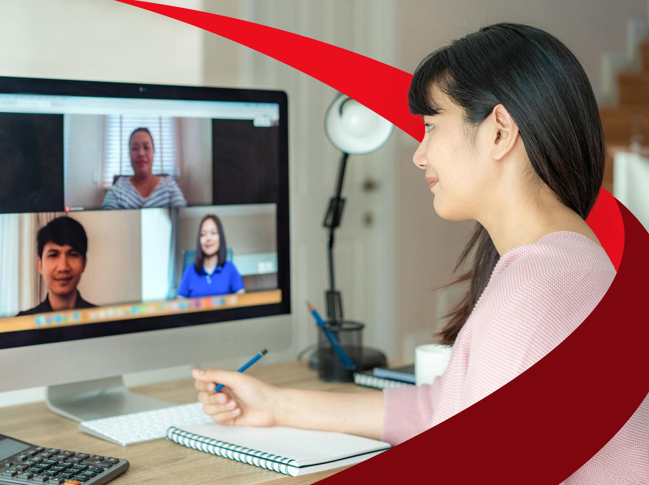 Woman attending a virtual work meeting
